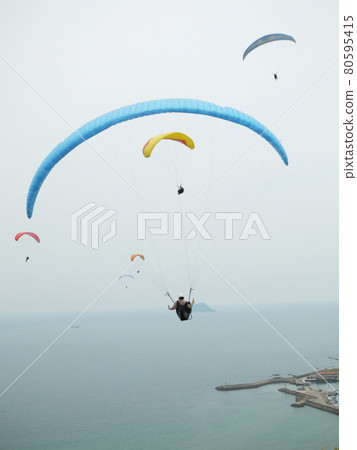 Flying umbrella Flying umbrella 80595415