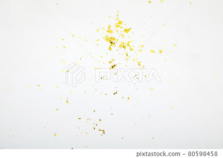 Spilled golden glitter on white table abstract 80598458