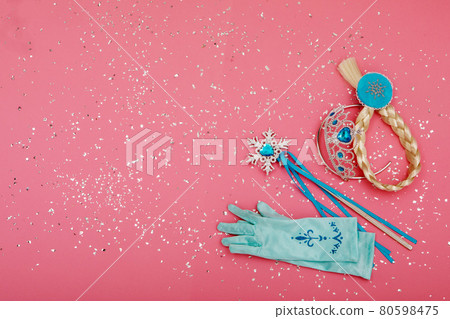 Set of fairy accessories on pink table Set of fairy accessories on pink table 80598475