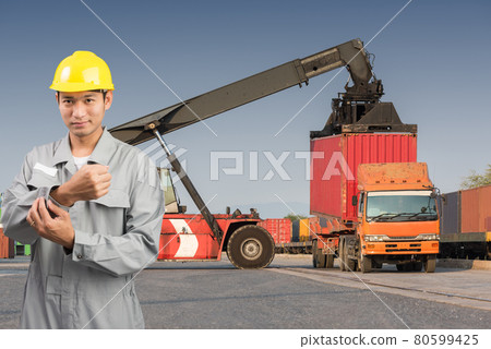 Foreman stand on front forklift loading Containers box Foreman stand on front forklift loading Containers box 80599425