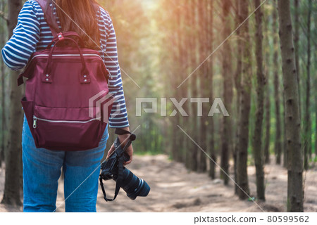 Young female woman lifestyle photographer travel taking photo Young female woman lifestyle photographer travel taking photo 80599562