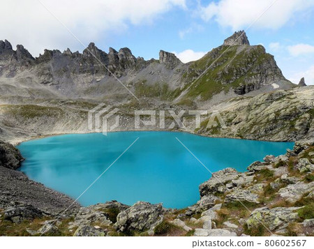 Rocky mountains and beautiful lakes in Pizol, eastern Switzerland 80602567