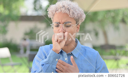 Portrait of African Woman Coughing Portrait of African Woman Coughing 80602726