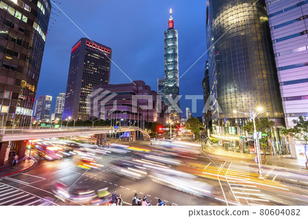 The crossroads near Taipei 101 Building and Taipei International Convention Center in Taipei, Taiwan, is in a busy rush hour of traffic. 80604082