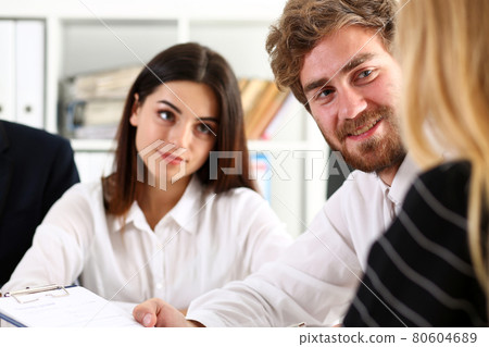 Group of people sit in office deliberate on problem 80604689