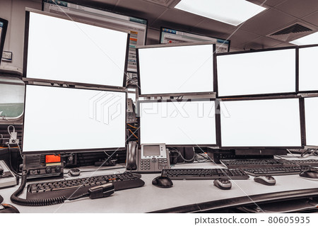 group of blank monitors and screen on security desk or control room for monitor process or stock data trading group of blank monitors and screen on security desk or control room for monitor process or stock data trading 80605935