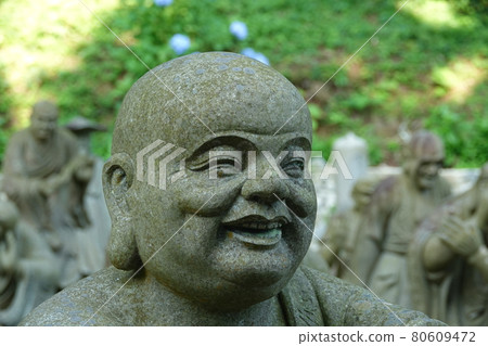 Stone Buddha statue at Unbeji Temple 80609472