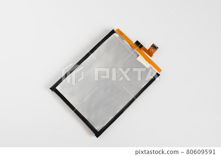 Rechargeable Li-ion battery for smartphone on background. 80609591