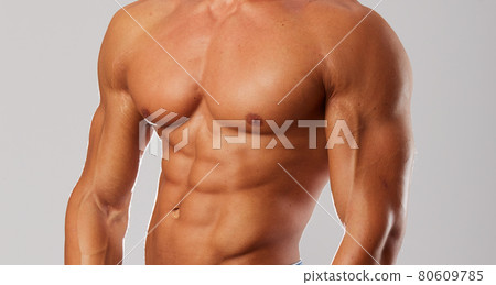 close up of male abdomen 80609785