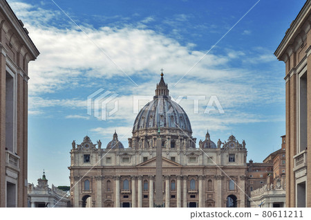 Facade and dome of The Papal Basilica of Saint Peter in the Vatican (Basilica di San Pietro), a Renaissance style church in Vatican City, within the city of Rome, Italy Facade and dome of The Papal Basilica of Saint Peter in the Vatican (Basilica di San Pietro), a Renaissance style church in Vatican City, within the city of Rome, Italy 80611211