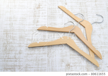 Natural wooden hanger 80611655