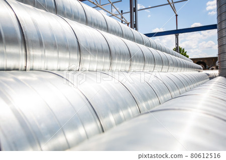 Ventilation pipe warehouse. Steel pipes, parts for the construction of air ducts for an industrial 80612516