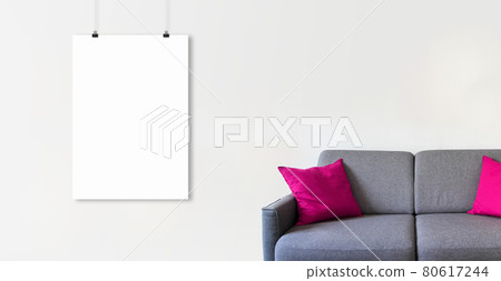Blank hanging poster on a white wall above a sofa. Horizontal banner Blank hanging poster on a white wall above a sofa. Horizontal banner 80617244
