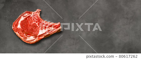Beef prime rib isolated on dark concrete background. Horizontal banner 80617262