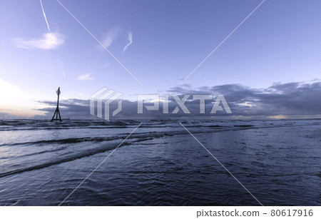 Sunset on Crosby Beach in winter, Crosby, Liverpool, United Kingdom Sunset on Crosby Beach in winter, Crosby, Liverpool, United Kingdom 80617916