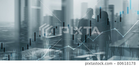 Trading candlestick chart and diagrams on blurred office center background people Trading candlestick chart and diagrams on blurred office center background people 80618178