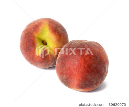 two ripe red peaches isolated on white background 80620070