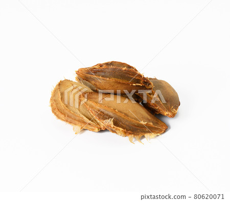 apricot pits on a white background, close up apricot pits on a white background, close up 80620071