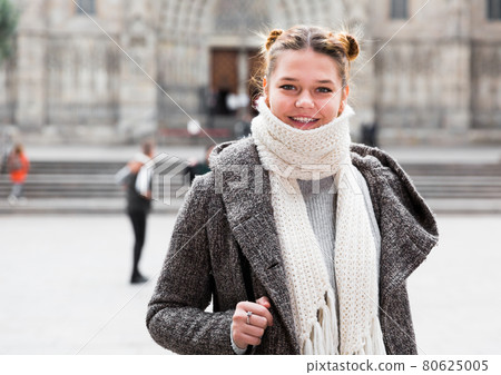 positive girl teenager in the city in scarf positive girl teenager in the city in scarf 80625005