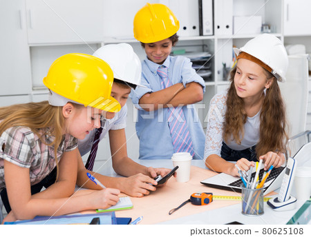 Boys and girls architects with plan 80625108
