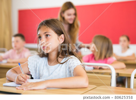 Children sitting in classroom Children sitting in classroom 80625358