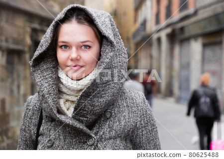 positive girl teenager in hood 80625488