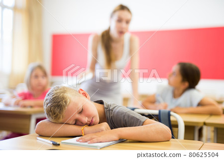 Boy have slept during lesson 80625504