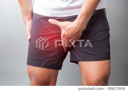 adult male with muscle pain during running. runner have leg ache due to Groin Pull, liotibial Band Syndrome (ITBS) or prostate cancer. Sports injuries and medical concept 80627609