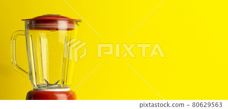 Vintage blender for cocktails and homemade food. Red blender on a yellow background. Minimal art concept, copy space Vintage blender for cocktails and homemade food. Red blender on a yellow background. Minimal art concept, copy space 80629563