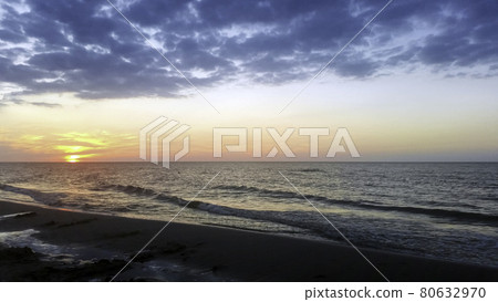 Sunset over Baltic Sea in Lubiatowo, Pomerania, Poland Sunset over Baltic Sea in Lubiatowo, Pomerania, Poland 80632970