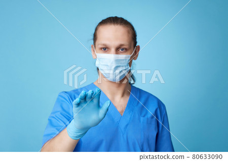 man doctor in uniform touching virtual screen 80633090