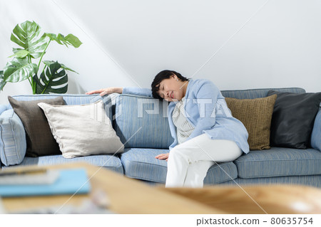 Senior woman tired napping Senior woman tired napping 80635754