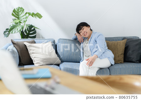 Senior woman tired napping Senior woman tired napping 80635755
