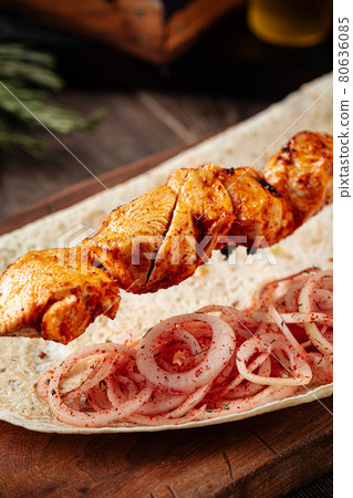 Grilled georgian chicken breast shashlik skewers 80636085