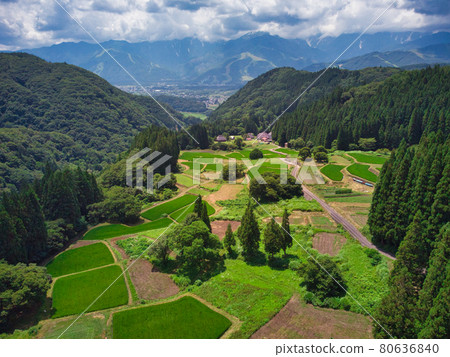 View of rice terraces in a beautiful blue demon village Hakuba Village, Nagano Prefecture (aerial view by drone) View of rice terraces in a beautiful blue demon village Hakuba Village, Nagano Prefecture (aerial view by drone) 80636840