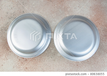 Old metal plates on concrete background. Old metal plates on concrete background. 80638055