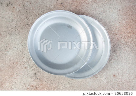 Old metal plates on concrete background. Old metal plates on concrete background. 80638056