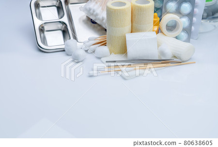 Wound care dressing set and stainless steel plate, forceps, cotton stick, conform bandage, elastic cohesive retention bandage, povidone-iodine, cotton ball with alcohol. Medical equipment for nurse. 80638605