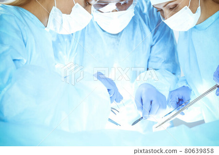 A group of surgeons is operating at the hospital. Health care concept A group of surgeons is operating at the hospital. Health care concept 80639858