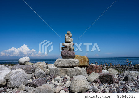 A stack of stones on a beach A stack of stones on a beach 80640533
