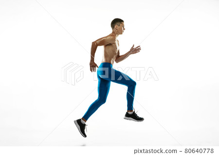 Workout. Young male athlete, runner practicing isolated on white studio background. Muscular, sportive man. Concept of sport, healthy lifestyle Workout. Young male athlete, runner practicing isolated on white studio background. Muscular, sportive man. Concept of sport, healthy lifestyle 80640778