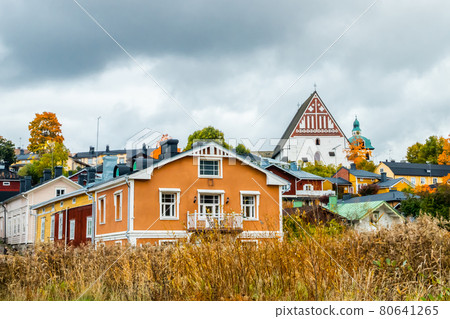 View of old Porvoo, Finland. Beautiful city autumn landscape with Porvoo Cathedral and colorful wooden buildings. 80641265