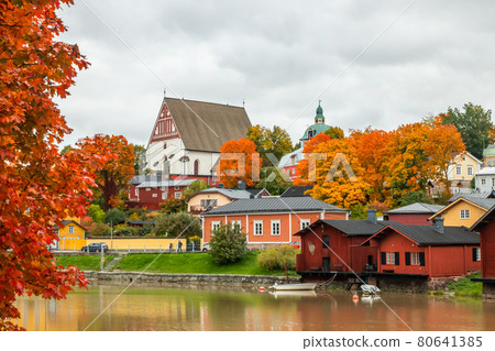 View of old Porvoo, Finland. Beautiful city autumn landscape with Porvoo Cathedral and colorful wooden buildings. View of old Porvoo, Finland. Beautiful city autumn landscape with Porvoo Cathedral and colorful wooden buildings. 80641385