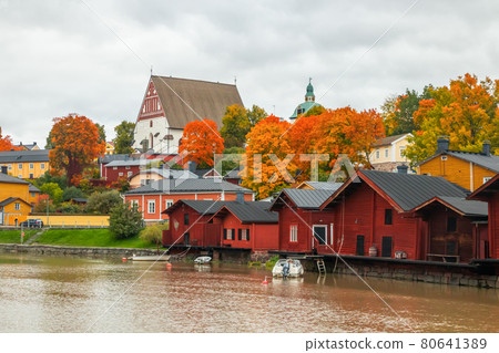 View of old Porvoo, Finland. Beautiful city autumn landscape with Porvoo Cathedral and colorful wooden buildings. View of old Porvoo, Finland. Beautiful city autumn landscape with Porvoo Cathedral and colorful wooden buildings. 80641389