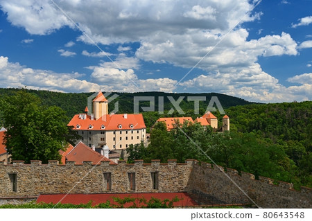 Beautiful old castle in the countryside on a summer day and the sun with blue sky. Beautiful old castle in the countryside on a summer day and the sun with blue sky. 80643548