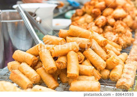 Hot fried snacks at asian street market 80643593