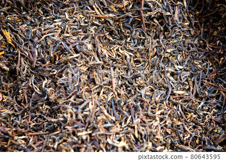 Heap of black tea at street market in asian town 80643595