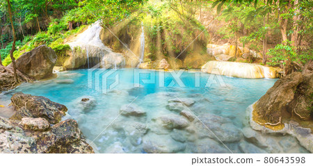 Panorama landscape of lake with cascades of waterfall in tropical forest in Erawan, Thailand 80643598