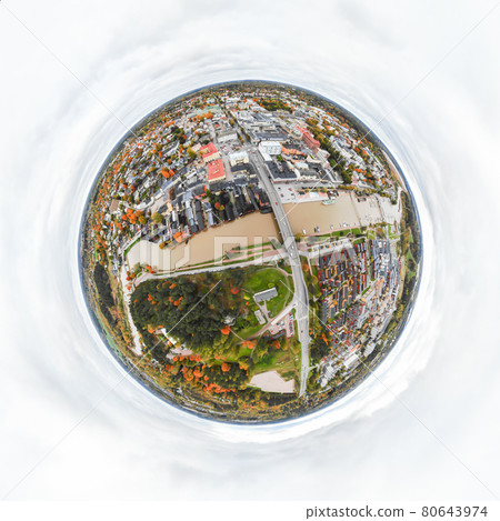 A three dimensional panoramic aerial view of the Old town of Porvoo, Finland in a mini planet panorama style. A three dimensional panoramic aerial view of the Old town of Porvoo, Finland in a mini planet panorama style. 80643974