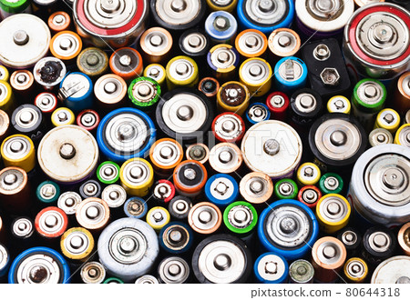 Used batteries toxic waste recycling and ecology issues concept background Used batteries toxic waste recycling and ecology issues concept background 80644318